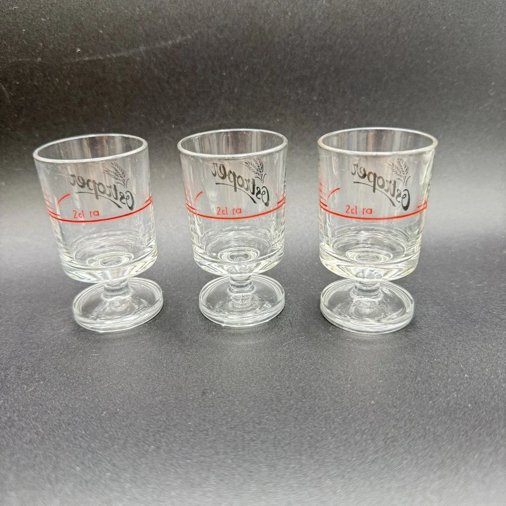 3 Ostroper Wheat Grass Logo Footed Shot Glasses Made France Vintage Marked 2cl